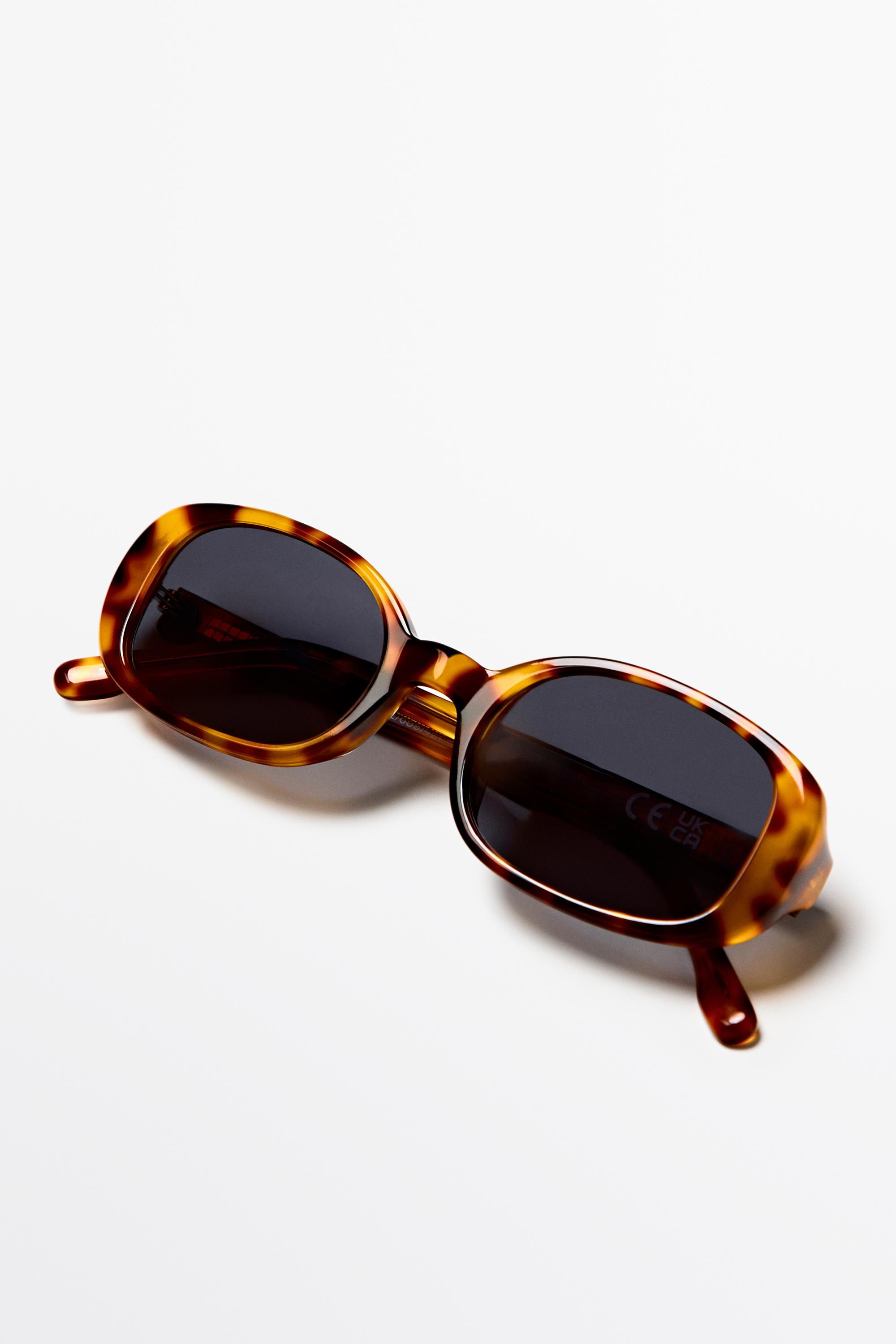 Lunettes de soleil ovales effet écaille